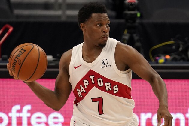 Toronto Raptors guard Kyle Lowry (7) moves the ball against the Denver Nuggets during the second half of an NBA basketball game Wednesday, March 24, 2021, in Tampa, Fla. (AP Photo/Chris O'Meara)
