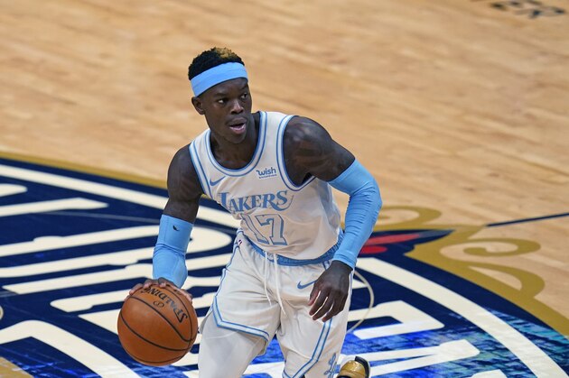 Los Angeles Lakers guard Dennis Schroder (17) dribbles down court in the first half of an NBA basketball game against the New Orleans Pelicans in New Orleans, Tuesday, March 23, 2021. (AP Photo/Gerald Herbert)