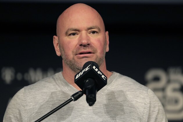 FILE - In this Nov. 2, 2018, file photo, UFC president Dana White speaks at a news conference in New York. The first of three straight fight nights at Etihad Arena on Abu Dhabiâ€™s Yas Island kicks off Saturday, Jan. 16, when Max Holloway fights Calvin Kattar in a 145-pound bout in the main event of the first combat sports card aired on ABC since 2000. In UFC 257 on Jan. 24, Conor McGregor returns from a year-long layoff for a rematch against Dustin Poirier in the promotions's first pay-per-view of the year. (AP Photo/Julio Cortez, File)