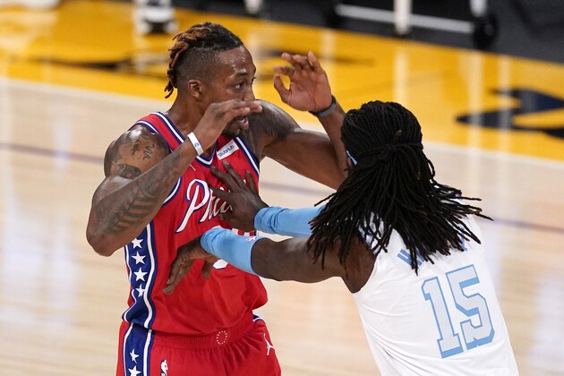 Los Angeles Lakers center Montrezl Harrell, right, shoves Philadelphia 76ers center Dwight Howard as they jockey for position during the first half of an NBA basketball game Thursday, March 25, 2021, in Los Angeles. (AP Photo/Mark J. Terrill) Los Angeles Lakers center Montrezl Harrell, right, shoves Philadelphia 76ers center Dwight Howard as they jockey for position during the first half of an NBA basketball game Thursday, March 25, 2021, in Los Angeles. (AP Photo/Mark J. Terrill)