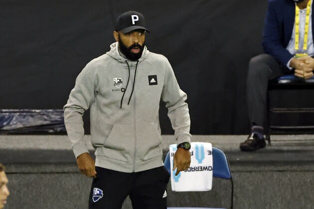 Montreal Impact coach Thierry Henry reacts during the first half of the team's MLS soccer match against Nashville SC, Tuesday, Oct. 27, 2020, in Harrison, N.J. (AP Photo/Adam Hunger)
