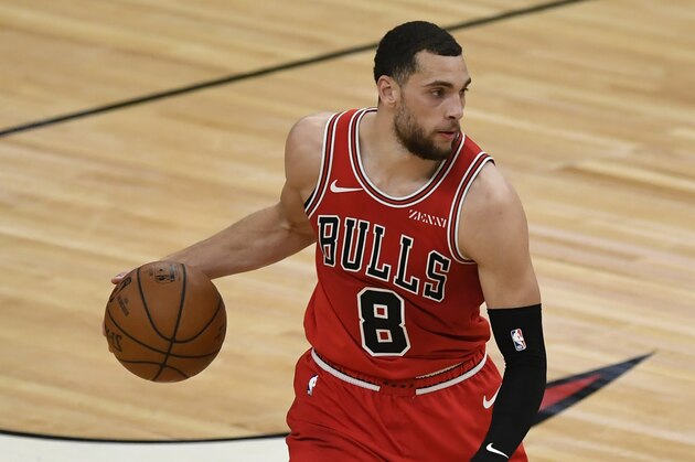 Chicago Bulls' Zach Lavine (8) looks to drive during the second half of an NBA basketball game against the Utah Jazz Monday, March 22, 2021, in Chicago. Utah won 120-95. (AP Photo/Paul Beaty)