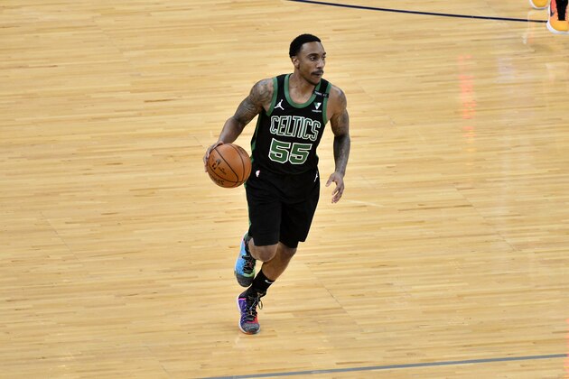 Boston Celtics guard Jeff Teague (55) brings the ball up court in the first half of an NBA basketball game against the Memphis Grizzlies Monday, March 22, 2021, in Memphis, Tenn. (AP Photo/Brandon Dill)