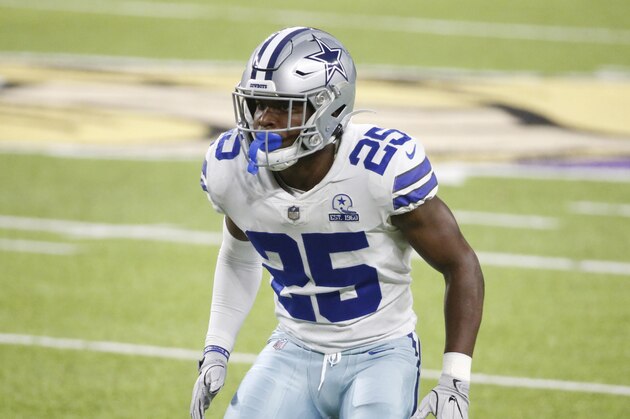 Dallas Cowboys safety Xavier Woods runs on the field during an NFL football game against the Minnesota Vikings, Sunday, Nov. 22, 2020, in Minneapolis. (AP Photo/Bruce Kluckhohn)