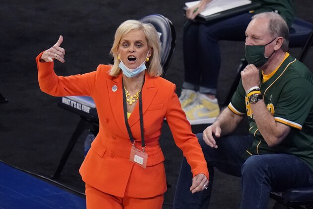 Baylor head coach Kim Mulkey calls to her players during the first half of a college basketball game against Michigan in the Sweet Sixteen round of the women's NCAA tournament at the Alamodome in San Antonio, Saturday, March 27, 2021. (AP Photo/Eric Gay) Baylor head coach Kim Mulkey calls to her players during the first half of a college basketball game against Michigan in the Sweet Sixteen round of the women's NCAA tournament at the Alamodome in San Antonio, Saturday, March 27, 2021. (AP Photo/Eric Gay)