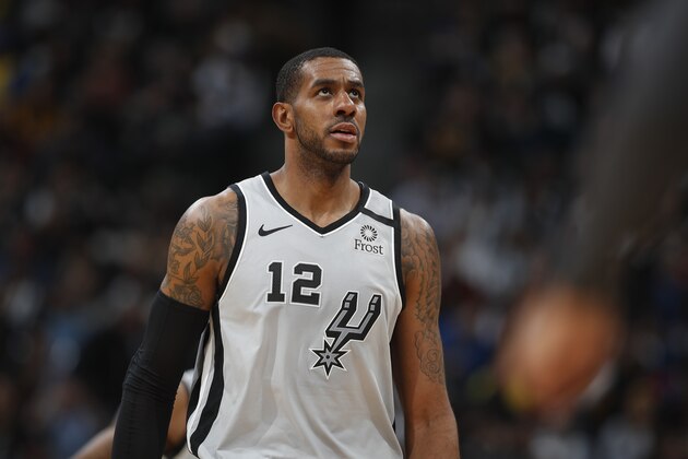 San Antonio Spurs forward LaMarcus Aldridge (12) in the second half of an NBA basketball game Monday, Feb.10, 2020, in Denver. The Nuggets won 127-120. (AP Photo/David Zalubowski)