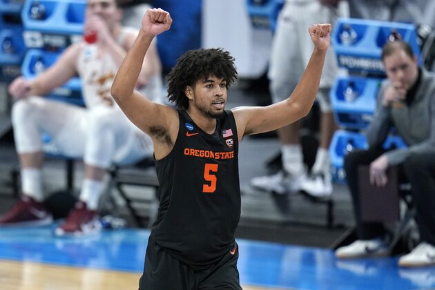 Oregon State guard Ethan Thompson celebrates during the second half of a Sweet 16 game against Loyola Chicago in the NCAA men's college basketball tournament at Bankers Life Fieldhouse, Saturday, March 27, 2021, in Indianapolis. (AP Photo/Jeff Roberson)