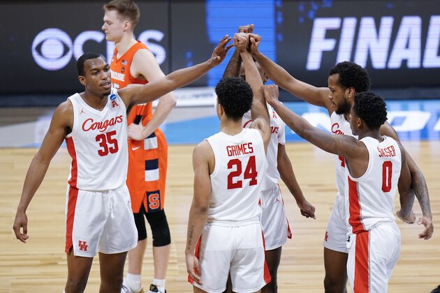 Houston forward Fabian White Jr. (35), Quentin Grimes (24), Marcus Sasser (0), Justin Gorham (4) and DeJon Jarreau (3) gather as Syracuse guard Buddy Boeheim (35) stands by in the second half of a Sweet 16 game in the NCAA men's college basketball tournament at Hinkle Fieldhouse in Indianapolis, Saturday, March 27, 2021. (AP Photo/AJ Mast)