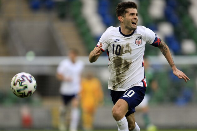 United States's Christian Pulisic controls the ball during an international friendly soccer match between Northern Ireland and United States, at Windsor Park, Belfast, Northern Ireland, Sunday, March 28, 2021. (AP Photo/Peter Morrison)