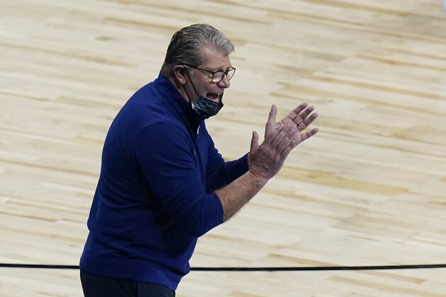 UConn head coach Geno Auriemma talks to displayers during the second half of a college basketball game against Iowa in the Sweet Sixteen round of the women's NCAA tournament at the Alamodome in San Antonio, Saturday, March 27, 2021. (AP Photo/Eric Gay)