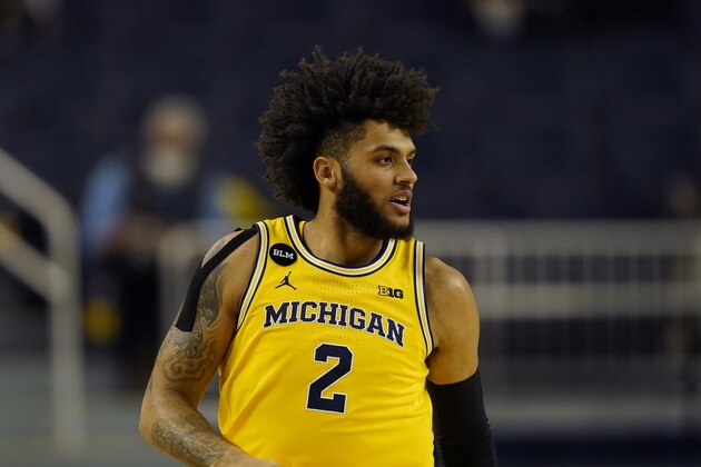 Michigan forward Isaiah Livers plays during the first half of an NCAA college basketball game, Thursday, March 4, 2021, in Ann Arbor, Mich. (AP Photo/Carlos Osorio)
