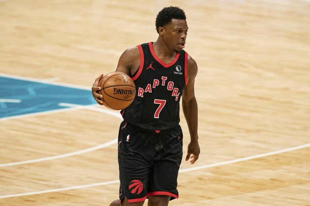 Toronto Raptors guard Kyle Lowry (7) brings the ball up court against the Charlotte Hornets during the second half of an NBA basketball game in Charlotte, N.C., Saturday, March 13, 2021. (AP Photo/Jacob Kupferman)