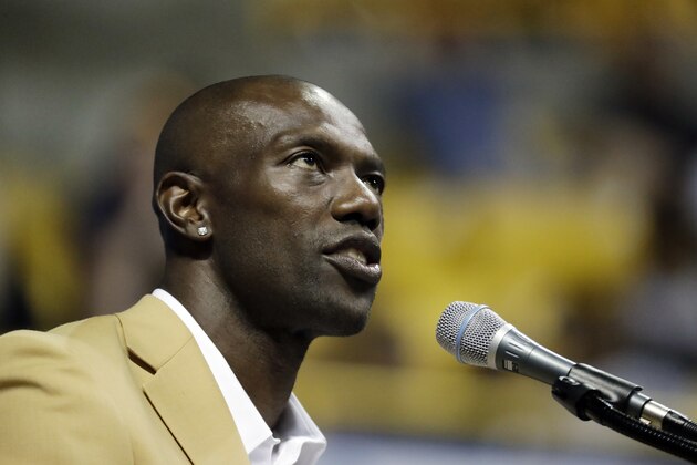 Former wide receiver Terrell Owens delivers his Pro Football Hall of Fame speech on Saturday, Aug. 4, 2018, in Chattanooga, Tenn. Instead of speaking at the Hall of Fame festivities in Canton, Ohio, Owens celebrated his induction at the University of Tennessee at Chattanooga, where he played football and basketball and ran track. (AP Photo/Mark Humphrey)