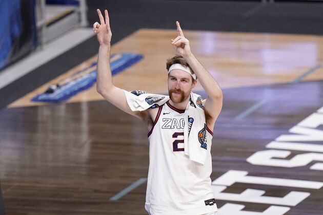 Gonzaga forward Drew Timme waves to fans after beating Creighton 83-65 in a Sweet 16 game in the NCAA men's college basketball tournament at Hinkle Fieldhouse in Indianapolis, Sunday, March 28, 2021. (AP Photo/AJ Mast)
