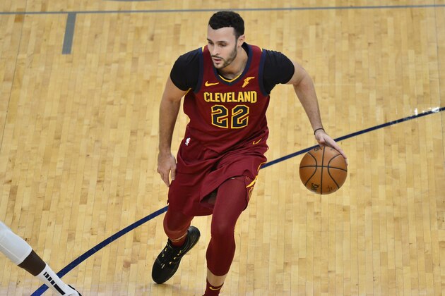 Cleveland Cavaliers forward Larry Nance Jr. (22) handles the ball in the first half of an NBA basketball game against the Memphis Grizzlies Thursday, Jan. 7, 2021, in Memphis, Tenn. (AP Photo/Brandon Dill)