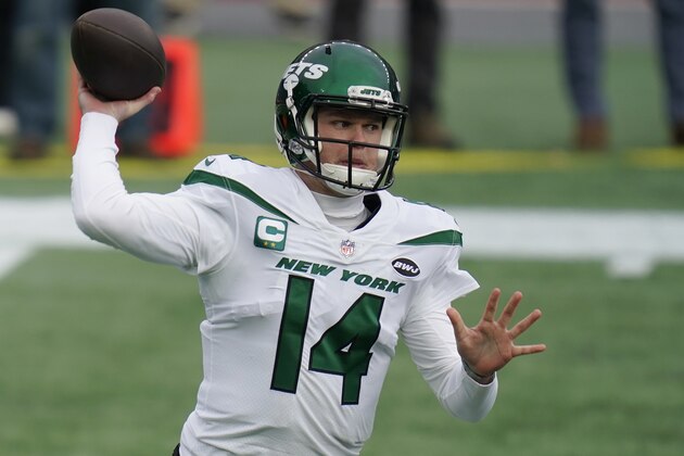 FILE - New York Jets quarterback Sam Darnold rolls out to pass against the New England Patriots in the first half of an NFL football game in Foxborough, Mass., in this Sunday, Jan. 3, 2021, file photo. The 23-year-old quarterback was considered an untouchable player on the roster only a year ago. General manager Joe Douglas has backed off that stance, though, and it could signal a major change at the position as free agency and the NFL draft approach. “I will answer the call if it's made,” Douglas said Wednesday, March 3, 2021, when asked if he'd listen to offers for Darnold from other teams. (AP Photo/Charles Krupa, File)