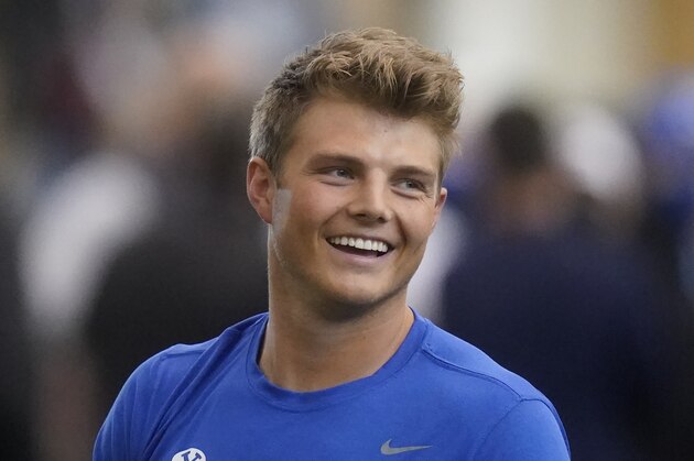 BYU quarterback Zach Wilson looks on before participating in the school's Pro Day football workout for NFL scouts Friday, March 26, 2021, in Provo, Utah. (AP Photo/Rick Bowmer)