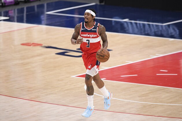 Washington Wizards guard Bradley Beal (3) dribbles the ball during the first half of an NBA basketball game against the Detroit Pistons, Saturday, March 27, 2021, in Washington. (AP Photo/Nick Wass)
