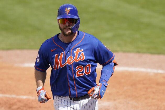 New York Mets' Pete Alonso (20) score son a solo home run during the fifth inning of a spring training baseball game against the Houston Astros, Tuesday, March 16, 2021, in Port St. Lucie, Fla. (AP Photo/Lynne Sladky)