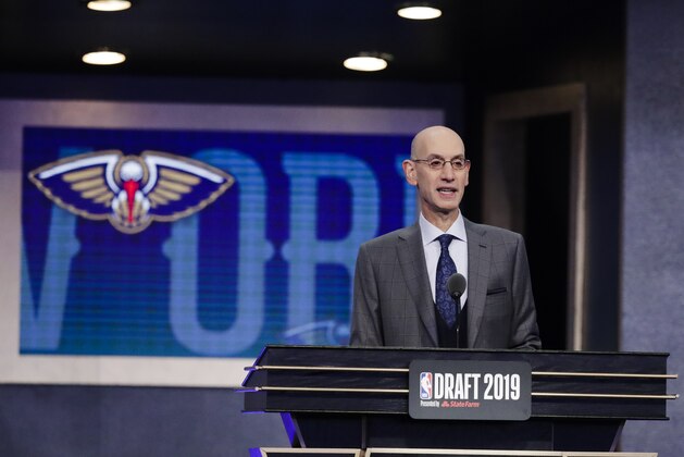 NBA Commissioner Adam Silver announces the New Orleans Pelicans' selection of Duke's Zion Williamson with the first pick in the NBA basketball draft Thursday, June 20, 2019, in New York. (AP Photo/Julio Cortez)