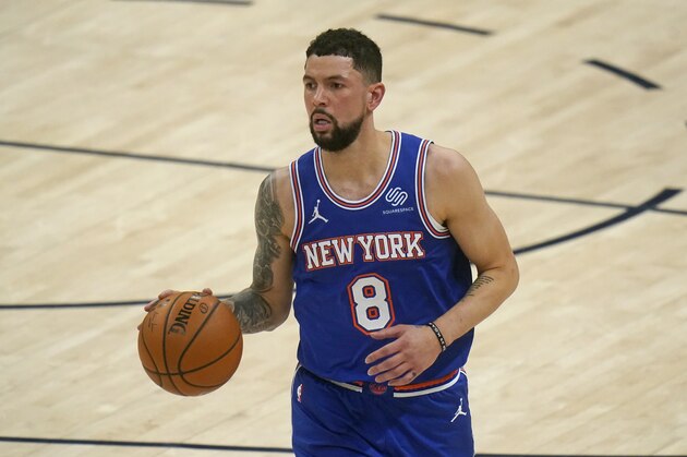 New York Knicks guard Austin Rivers (8) brings the ball up court in the second half during an NBA basketball game against the Utah Jazz Tuesday, Jan. 26, 2021, in Salt Lake City. (AP Photo/Rick Bowmer)