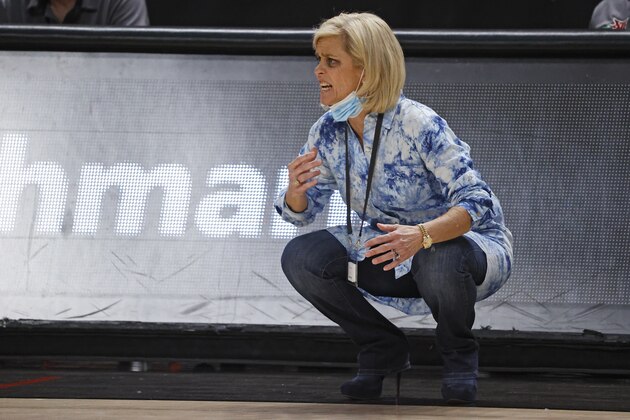Baylor coach Kim Mulkey yells out to her team during the first half of an NCAA college basketball game against Texas Tech, Wednesday, Feb. 10, 2021, in Lubbock, Texas. (AP Photo/Brad Tollefson)