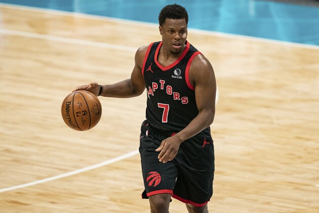 Toronto Raptors guard Kyle Lowry (7) brings the ball up court against the Charlotte Hornets during the second half of an NBA basketball game in Charlotte, N.C., Saturday, March 13, 2021. (AP Photo/Jacob Kupferman)