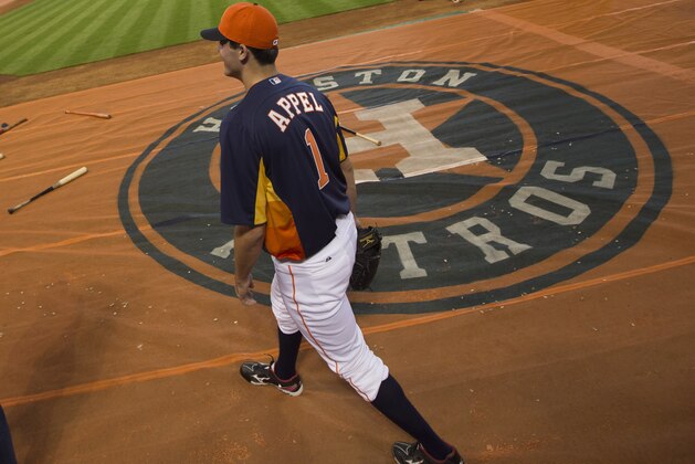 Newly signed Houston Astros pitcher Mark Appel walks onto the field after a news conference Wednesday, June 19, 2013 in Houston, to announce his signing. Appel was selected with the first overall pick in the 2013 MLB First-Year Player Draft. (AP Photo/David J. Phillip)