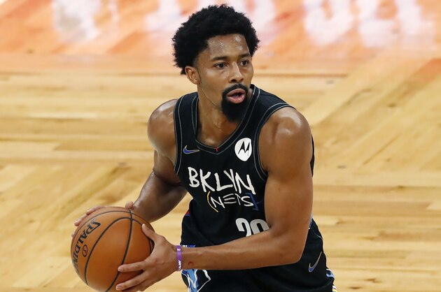 Brooklyn Nets' Spencer Dinwiddie plays against the Boston Celtics during the first half of an NBA basketball game, Friday, Dec. 25, 2020, in Boston. (AP Photo/Michael Dwyer)
