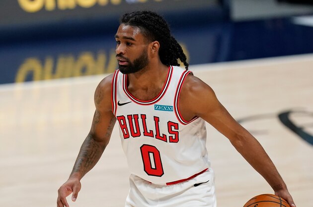 Chicago Bulls guard Coby White (0) in the first half of an NBA basketball game Friday, March 19, 2021, in Denver. (AP Photo/David Zalubowski)