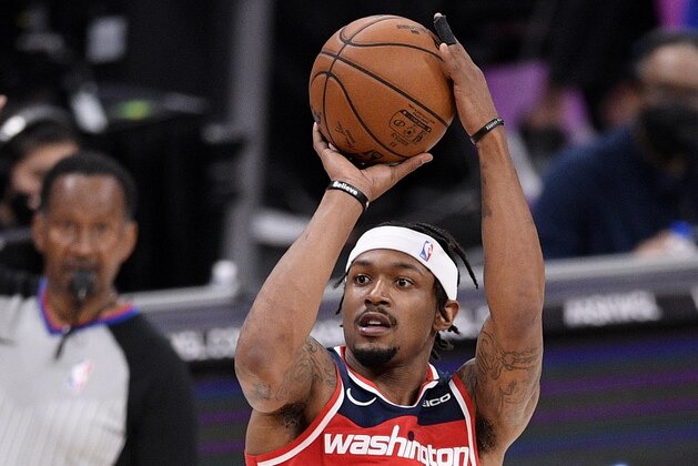 Washington Wizards guard Bradley Beal (3) shoots during the first half of an NBA basketball game against the Detroit Pistons, Saturday, March 27, 2021, in Washington. (AP Photo/Nick Wass)