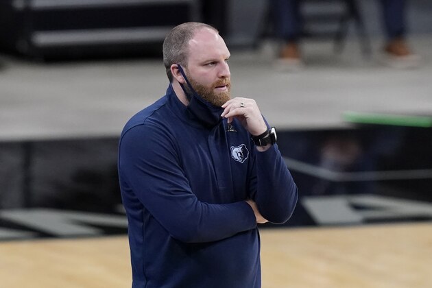Memphis Grizzlies head coach Taylor Jenkins watches from the sideline during the first half of an NBA basketball game against the San Antonio Spurs in San Antonio, Monday, Feb. 1, 2021. (AP Photo/Eric Gay)