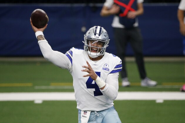 Dallas Cowboys quarterback Dak Prescott throws a pass in the first half of an NFL football game against the New York Giants in Arlington, Texas, Sunday, Oct. 11, 2020. (AP Photo/Michael Ainsworth)