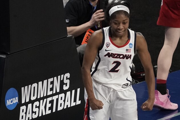 Arizona's Aari McDonald reacts after making a basket during the second half of an NCAA college basketball game against Indiana in the Elite Eight round of the Women's NCAA tournament Monday, March 29, 2021, at the Alamodome in San Antonio. (AP Photo/Morry Gash) Arizona's Aari McDonald reacts after making a basket during the second half of an NCAA college basketball game against Indiana in the Elite Eight round of the Women's NCAA tournament Monday, March 29, 2021, at the Alamodome in San Antonio. (AP Photo/Morry Gash)