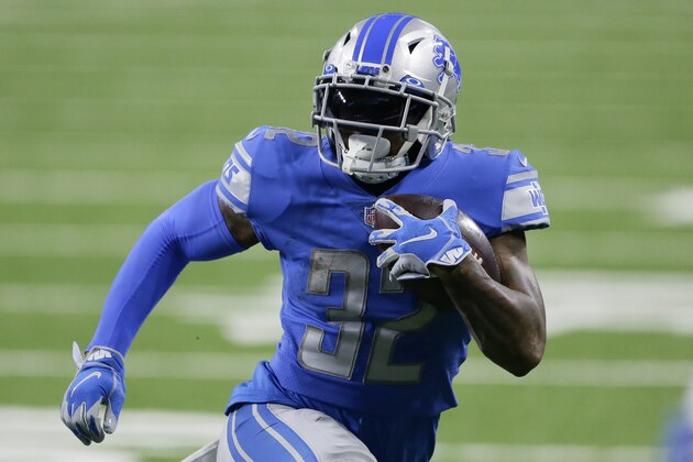 Detroit Lions running back D'Andre Swift (32) carries the ball against the Minnesota Vikings during the second half of an NFL football game, Sunday, Jan. 3, 2021, in Detroit. (AP Photo/Duane Burleson)