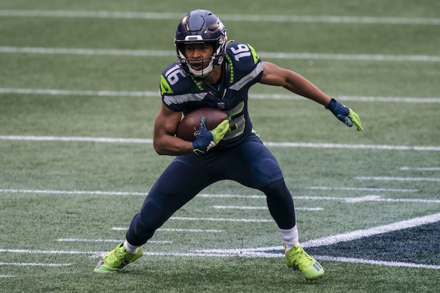Seattle Seahawks wide receiver Tyler Lockett runs with the ball after a reception during the first half of an NFL football game against the New York Jets, Sunday, Dec. 13, 2020, in Seattle. The Seahawks won 40-3. (AP Photo/Stephen Brashear) Seattle Seahawks wide receiver Tyler Lockett runs with the ball after a reception during the first half of an NFL football game against the New York Jets, Sunday, Dec. 13, 2020, in Seattle. The Seahawks won 40-3. (AP Photo/Stephen Brashear)