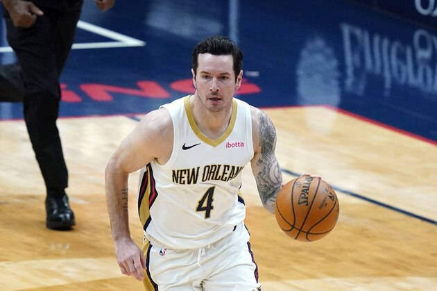 New Orleans Pelicans guard JJ Redick (4) moves the ball up court in the first half of an NBA basketball game against the Utah Jazz in New Orleans, Monday, March 1, 2021. (AP Photo/Gerald Herbert)