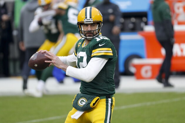 Green Bay Packers quarterback Aaron Rodgers warms up before an NFL divisional playoff football game between the Los Angeles Rams and Green Bay Packers, Saturday, Jan. 16, 2021, in Green Bay, Wis. (AP Photo/Mike Roemer)