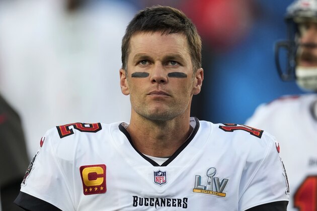 Tampa Bay Buccaneers quarterback Tom Brady stands on the field before the NFL Super Bowl 55 football game between the Kansas City Chiefs and Buccaneers, Sunday, Feb. 7, 2021, in Tampa, Fla. (AP Photo/Chris O'Meara)