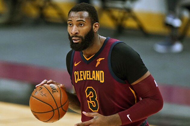 FILE - In this Feb 5, 2021, file photo, Cleveland Cavaliers' Andre Drummond drives the second half of an NBA basketball game against the Milwaukee Bucks in Cleveland. Drummond is now a free agent and can sign with a contending team after reaching a buyout with the Cavaliers. Drummond, who has not played since mid-February, began negotiating terms of the buyout with the Cavs on Thursday, March 25, 2021, after the club could not trade the 27-year-old. (AP Photo/Tony Dejak, File)