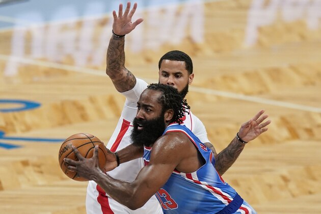 Brooklyn Nets' James Harden drives past Houston Rockets' D.J. Augustin during the first half of an NBA basketball game Wednesday, March 31, 2021, in New York. (AP Photo/Frank Franklin II)