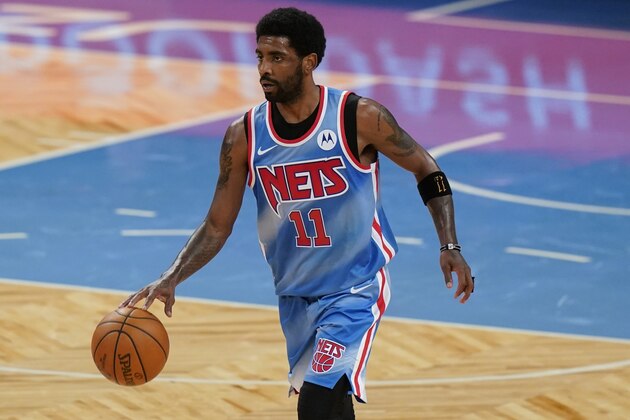 Brooklyn Nets' Kyrie Irving (11) during the first half of an NBA basketball game against the Houston Rockets Wednesday, March 31, 2021, in New York. (AP Photo/Frank Franklin II)