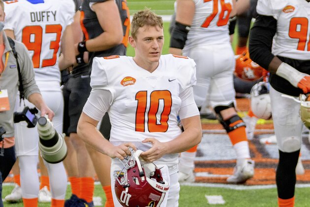 American Team quarterback Mac Jones of Alabama (10) walks the field during the end of NCAA Senior Bowl college football game in Mobile, Ala., Saturday, Jan. 30, 2021. (AP Photo/Matthew Hinton)