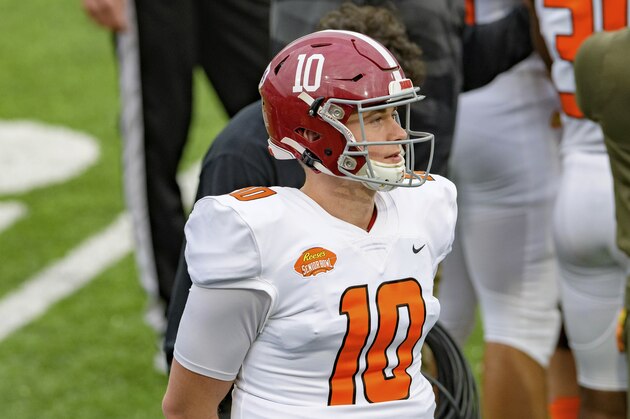 American Team quarterback Mac Jones of Alabama (10) walks the sideline during the NCAA Senior Bowl college football game in Mobile, Ala., Saturday, Jan. 30, 2021. (AP Photo/Matthew Hinton)