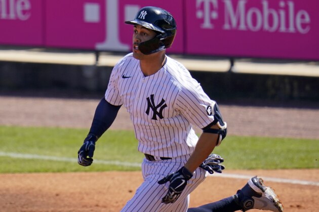 New York Yankees' Giancarlo Stanton pulls into second with a double during the second inning of a spring training exhibition baseball game against the Philadelphia Phillies at George M. Steinbrenner Field in Tampa, Fla., Sunday, March 7, 2021. (AP Photo/Gene J. Puskar