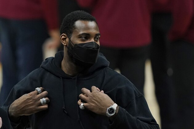 Cleveland Cavaliers' Andre Drummond is shown during a timeout in the second half of an NBA basketball game against the Oklahoma City Thunder, Sunday, Feb. 21, 2021, in Cleveland. (AP Photo/Tony Dejak)