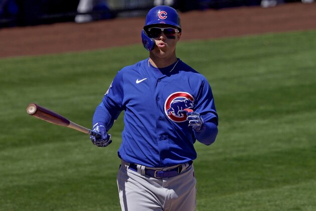 Chicago Cubs' Joc Pederson reacts after a strike during the first inning of a spring training baseball game against the Los Angeles Angels, Monday, March 22, 2021, in Tempe, Ariz. (AP Photo/Matt York)