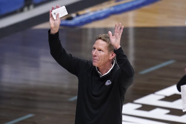 Gonzaga head coach Mark Few waves to fans after beating Creighton 83-65 in a Sweet 16 game in the NCAA men's college basketball tournament at Hinkle Fieldhouse in Indianapolis, Sunday, March 28, 2021. (AP Photo/Michael Conroy)