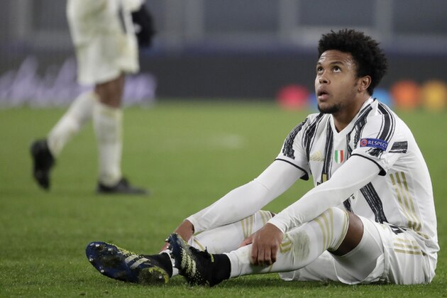 Juventus' Weston McKennie sits on the pitch at the end of the Champions League, round of 16, second leg, soccer match between Juventus and Porto in Turin, Italy, Tuesday, March 9, 2021. Juventus won 3-2 but Porto advances on a 4-4 aggregate result. (AP Photo/Luca Bruno)