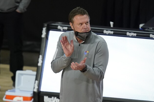 Kansas head coach Bill Self watches from the bench during the first half of an NCAA college basketball game against Iowa State, Saturday, Feb. 13, 2021, in Ames, Iowa. (AP Photo/Charlie Neibergall)